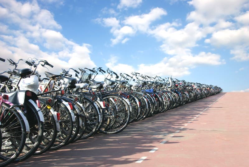 Hundreds of bicycles parked together. Hundreds of bicycles parked together
