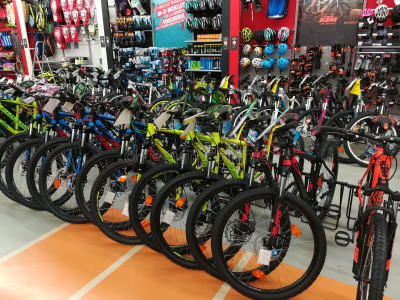 Bicycles in a sports store and other sports equipment. Bicycles in a sports store and other sports equipment.