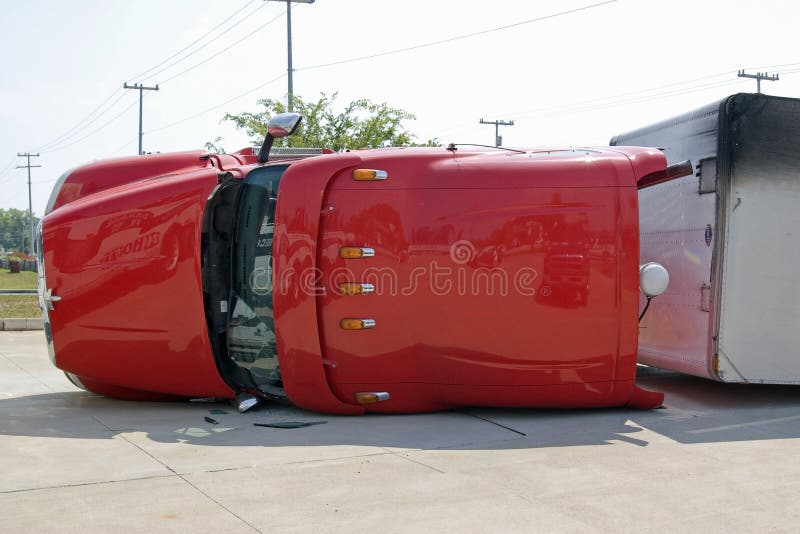 Eighteen wheeler lost control and flipped over on it's side,. Eighteen wheeler lost control and flipped over on it's side,