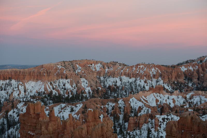 Faint Sunset Begins Over Snowy Bryce Canyon