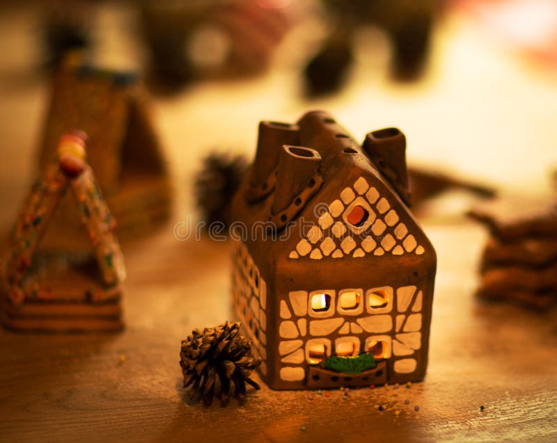 Fairy Christmas house cake with candle light inside and nice background lights