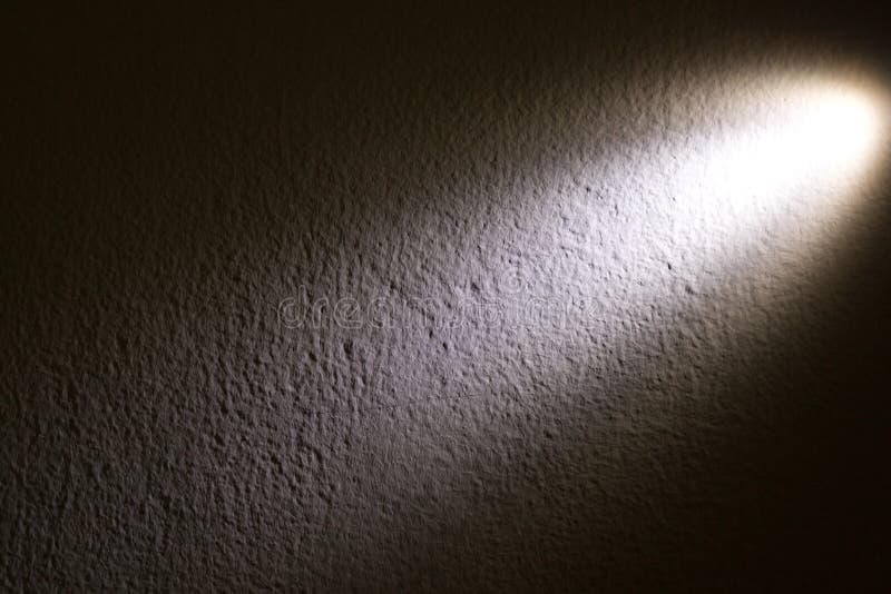Faisceau de lumière d'endroit sur le mur images libres de droits Faisceau de lumière d'endroit sur le mur images libres de droits