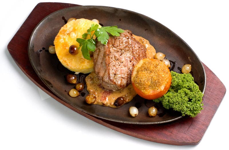 Faixa da carne com alho Gratine fotografia de stock Faixa da carne com alho Gratine fotografia de stock