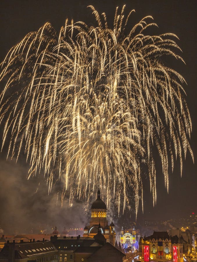 Beautiful fireworks show takes place in Avram Iancu Square in Cluj Napoca with the ocassion of The Romanian National day on 1 December 2013 in Cluj Napoca, Romania. Beautiful fireworks show takes place in Avram Iancu Square in Cluj Napoca with the ocassion of The Romanian National day on 1 December 2013 in Cluj Napoca, Romania.