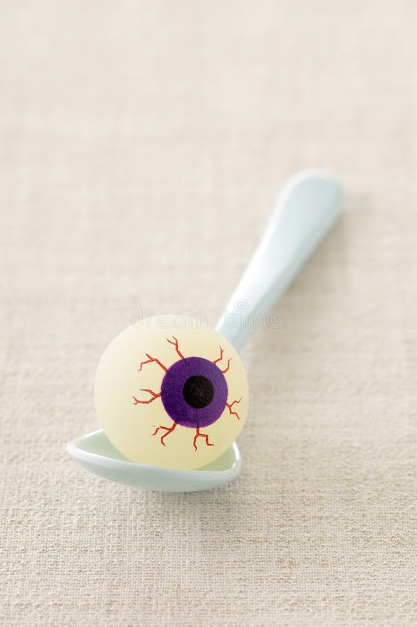 Fake eye in a spoon stock photo. Image of color, spoon 23705642
