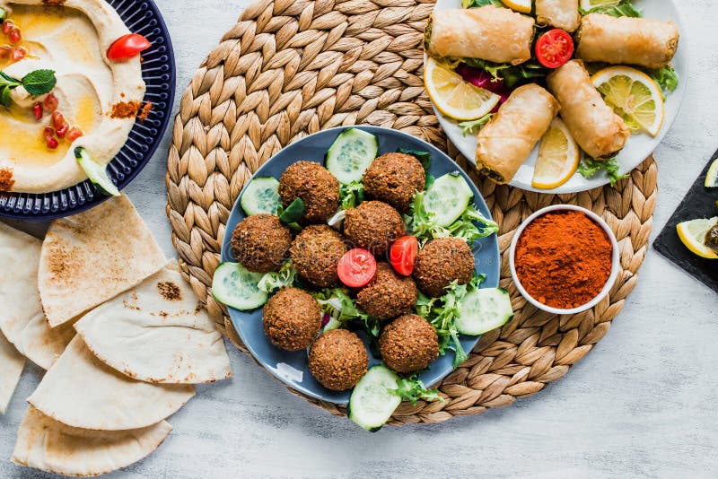 Hummus On A Plate, Hand Holding Pita Bread, Eating Stock Image - Image ...