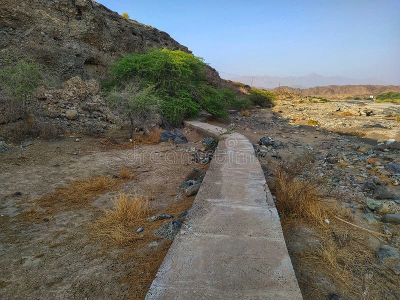 Falaj &x28;water canal&x29; in wadi Alkhodh valley, Muscat Oman