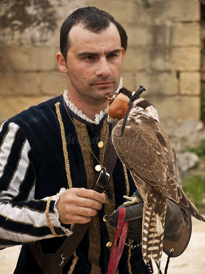 MDINA, MALTA - APR19 - Falconry during medieval reenactment in the old city of Mdina in Malta April 19, 2009. MDINA, MALTA - APR19 - Falconry during medieval reenactment in the old city of Mdina in Malta April 19, 2009