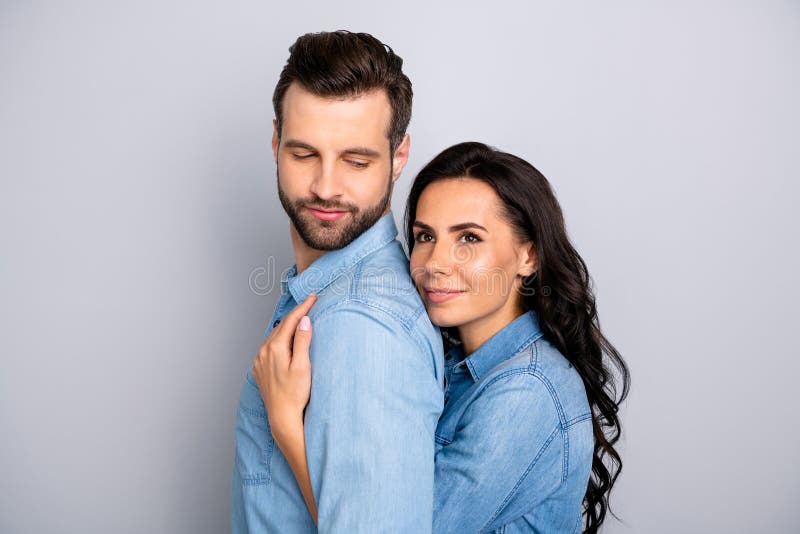 Fall in love. Close up photo of satisfied beautiful casual married students workers think dream future perfect family stock image