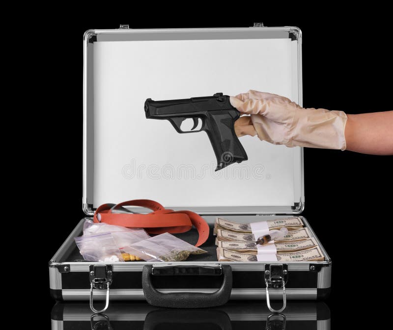 Silver case with money, gun and drugs on black background. Silver case with money, gun and drugs on black background