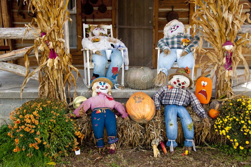 A fall scene with scarecrows