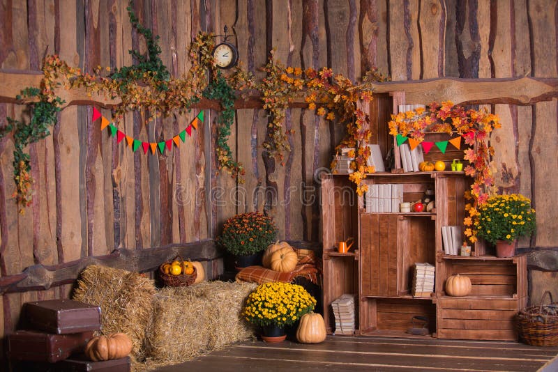 Fall wooden interior with pumkins, autumn leaves and flowers. Halloween thanksgiving decoration. stock images Fall wooden interior with pumkins, autumn leaves and flowers. Halloween thanksgiving decoration. stock images