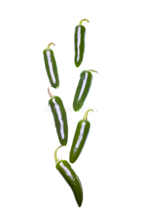 Falling jalapeno peppers. stock photo. Image of spicy 28927336