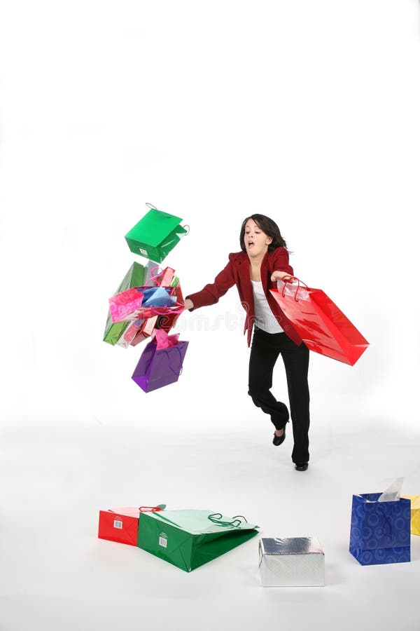 Falling teen with shopping bags