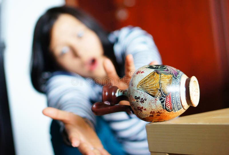 Mum just caught the vase in time