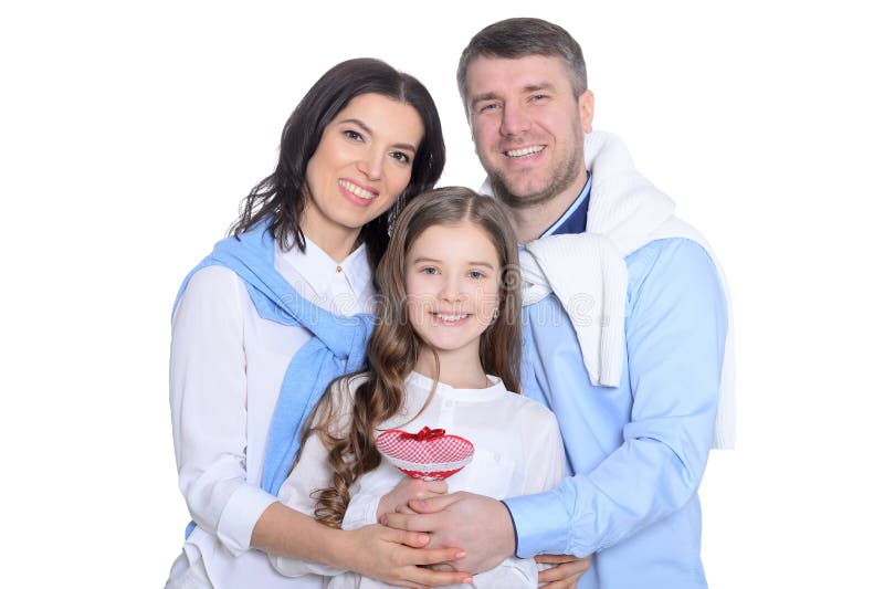 Fam?lia de tr?s feliz no fundo branco fotografia de stock royalty free Fam?lia de tr?s feliz no fundo branco fotografia de stock royalty free