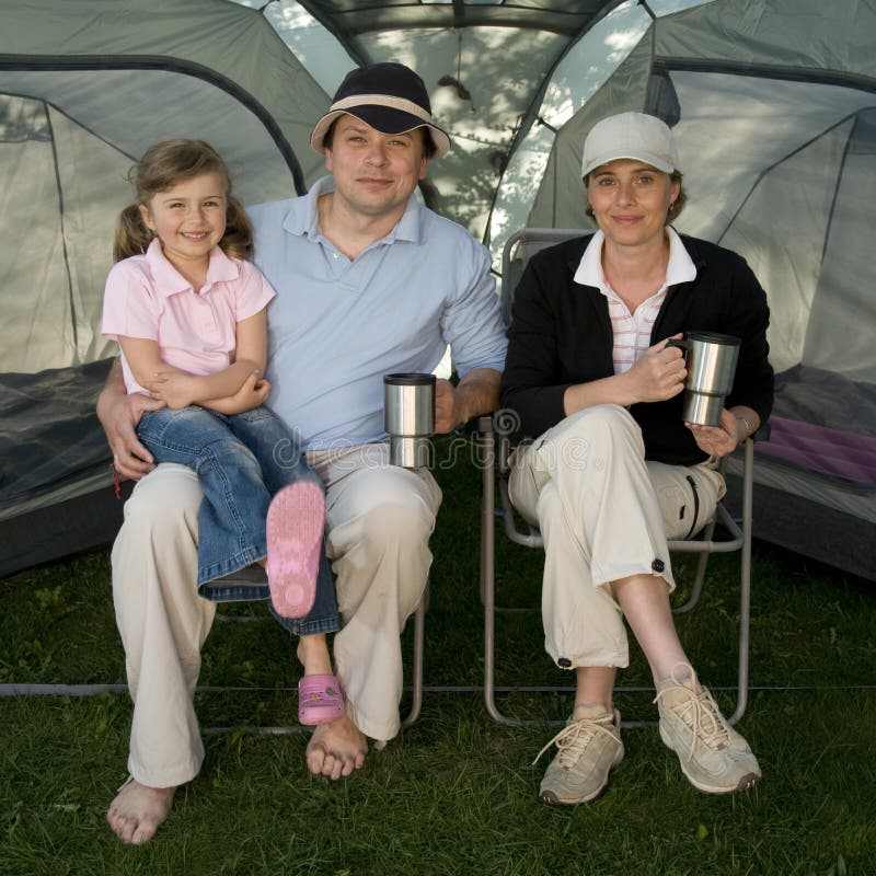 Happy family camping in tent. Happy family camping in tent