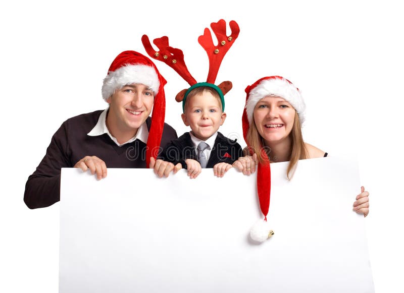 Familia de la Navidad con la bandera imágenes de archivo libres de regalías Familia de la Navidad con la bandera imágenes de archivo libres de regalías