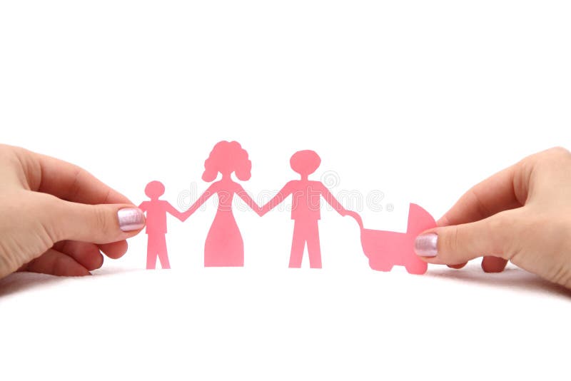 Familia de papel en manos imagen de archivo Familia de papel en manos imagen de archivo