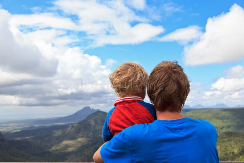 Family looking at Mauritius mountains in Black river georges. Family looking at Mauritius mountains in Black river georges