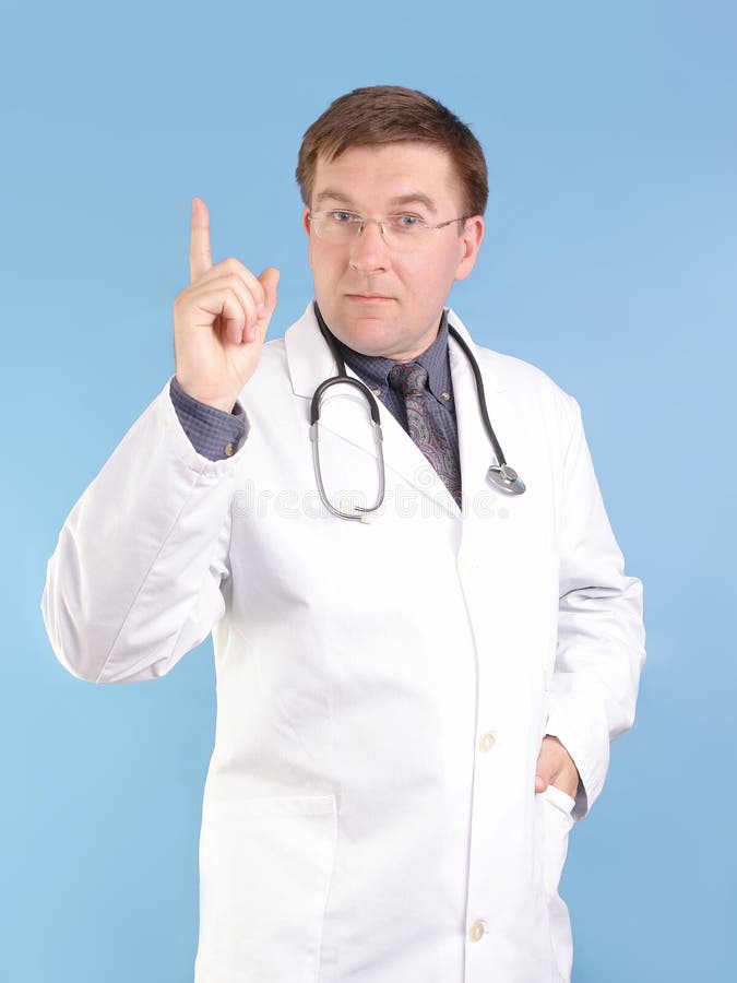 Familiendoktor, der oben zeigt stockfoto Familiendoktor, der oben zeigt stockfoto