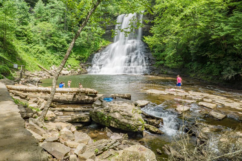 Giles County, VA â€“ June 1st: Families enjoying swimming at the Cascades Falls located in Jefferson National Forest, Giles County, Virginia, USA on June 1st, 2018. Giles County, VA â€“ June 1st: Families enjoying swimming at the Cascades Falls located in Jefferson National Forest, Giles County, Virginia, USA on June 1st, 2018.