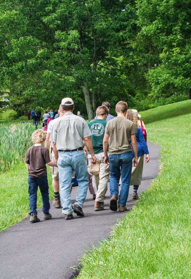 Bedford County, VA â€“ June 14th: Families enjoying a walk trail on a sunny afternoon around Abbott Lake at the Peaks of Otter on the Blue Ridge Parkway, Virginia, USA located at mile 85.6. Bedford County, VA on the 14th of June, 2016. Bedford County, VA â€“ June 14th: Families enjoying a walk trail on a sunny afternoon around Abbott Lake at the Peaks of Otter on the Blue Ridge Parkway, Virginia, USA located at mile 85.6. Bedford County, VA on the 14th of June, 2016.