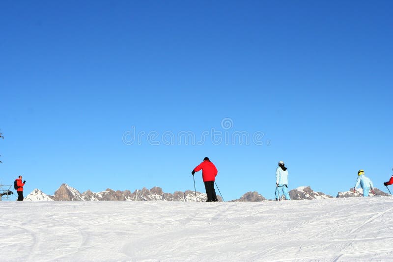 Family skiing in Alps stock image. Image of peaks, cold 4268777
