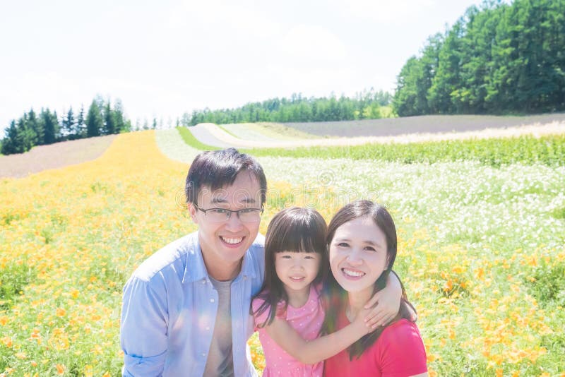 Famille avec le paysage dans Furano
