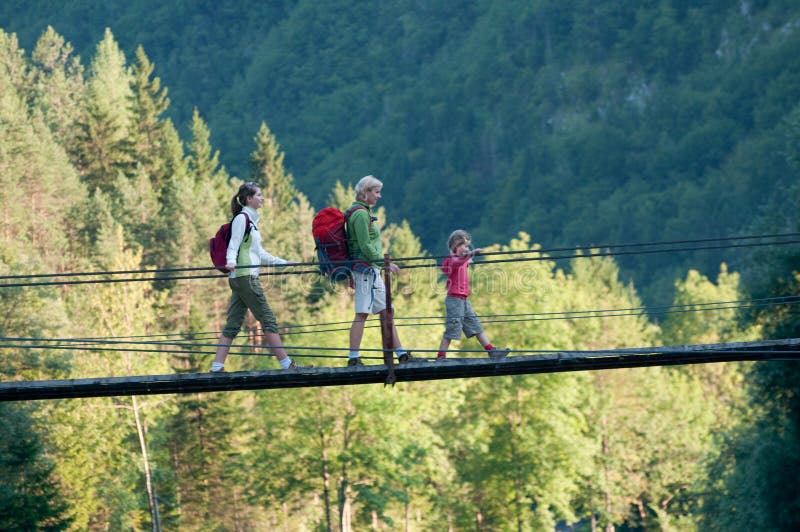 Girls with mother on mountain trek. Girls with mother on mountain trek