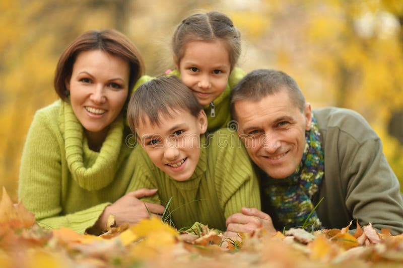 Family in autumn park