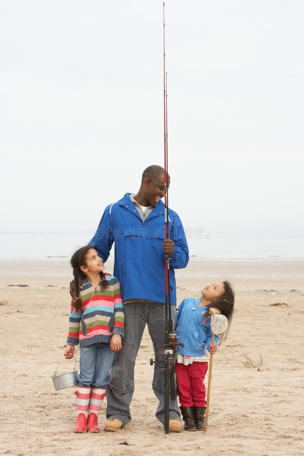 Family On Beach Fishing Trip