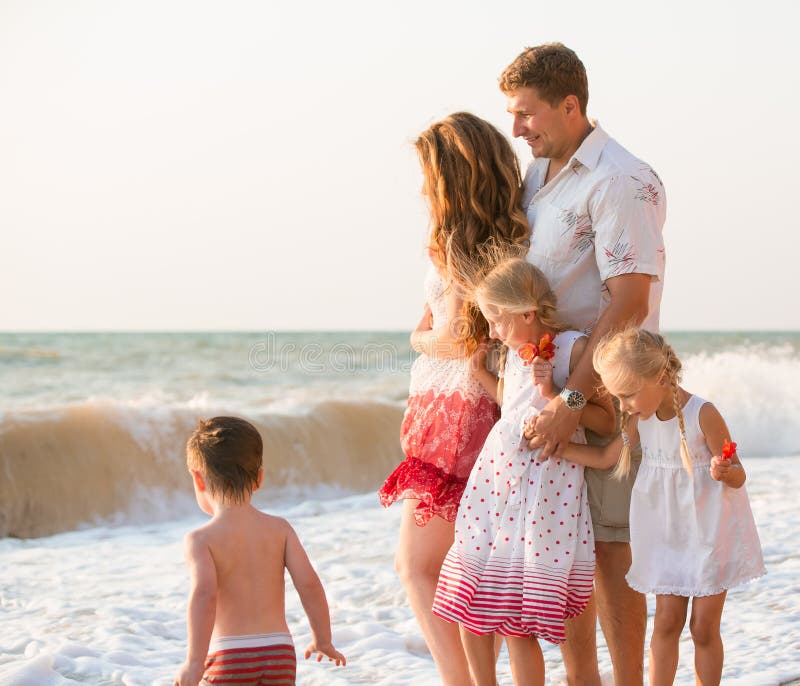 Family on the beach royalty free stock images