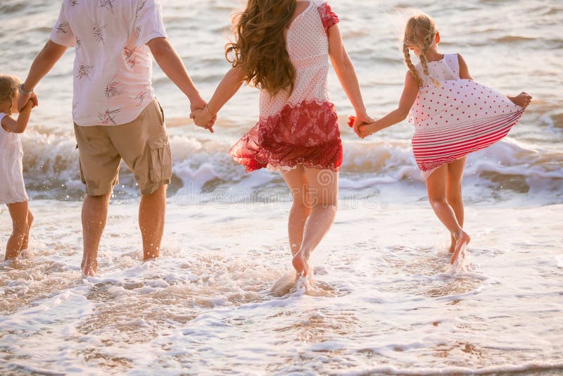 Family on the beach stock images