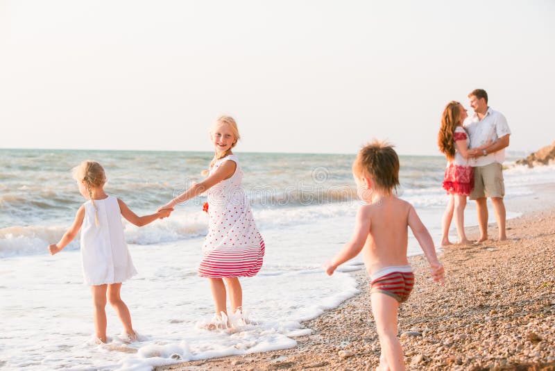 Family on the beach royalty free stock photo