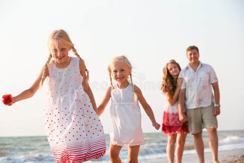 Family on the beach stock image