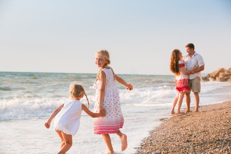 Family on the beach stock image