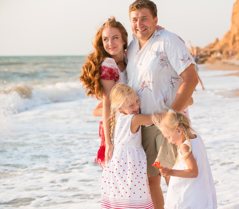 Family on the beach royalty free stock photography