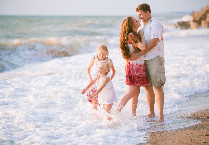 Family on the beach royalty free stock photo