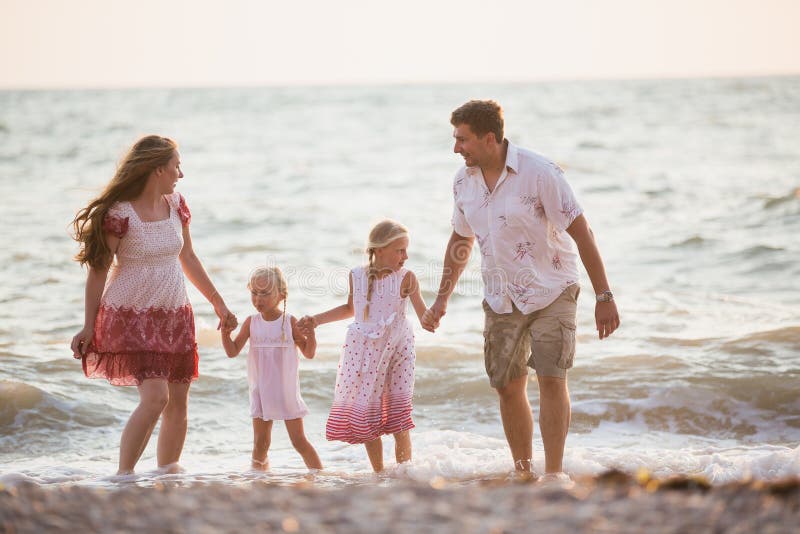 Family on the beach stock image