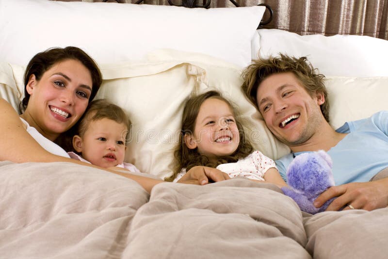 Family in bed stock image. Image of parent, kids, family 9232405