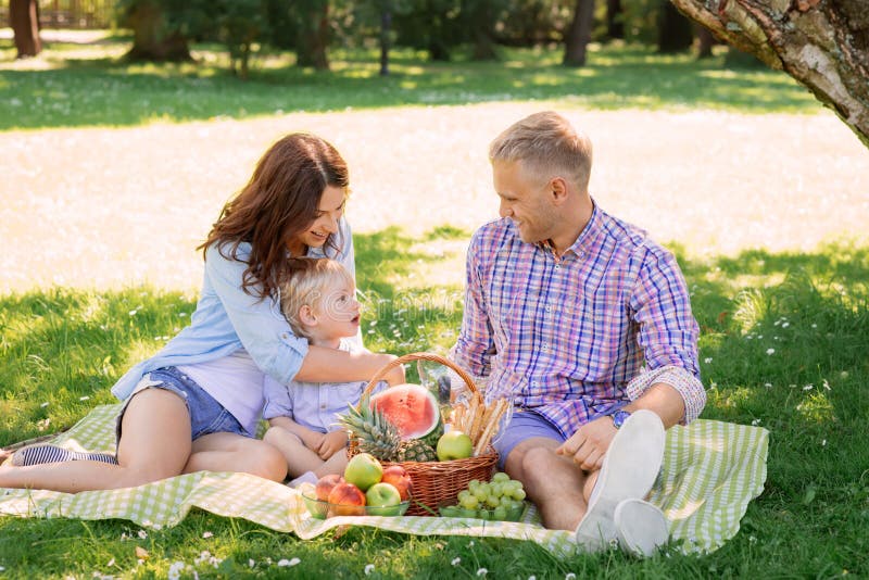 Family being together on vacation having a picnic royalty free stock photos Family being together on vacation having a picnic royalty free stock photos