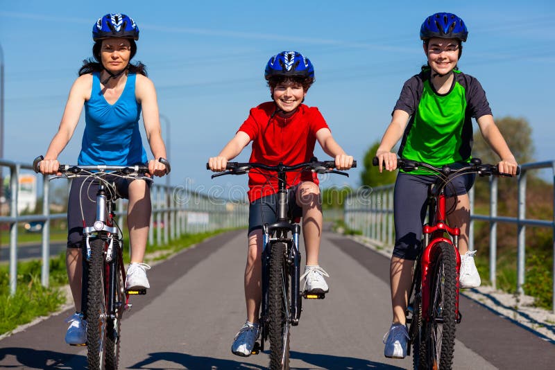 Family biking stock image. Image of horizontal, girls - 29484989