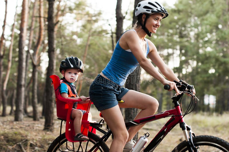 Family biking in the forest.