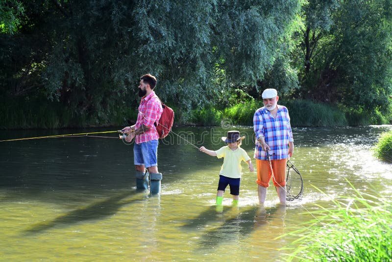 Family bonding. Anglers. Happy weekend concept. Man teaching kids how to fish in river. Portrait of happy little son