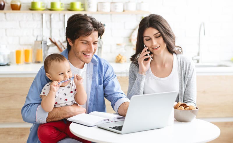 Family business. Partners spouses working from home, consulting clients online at kitchen