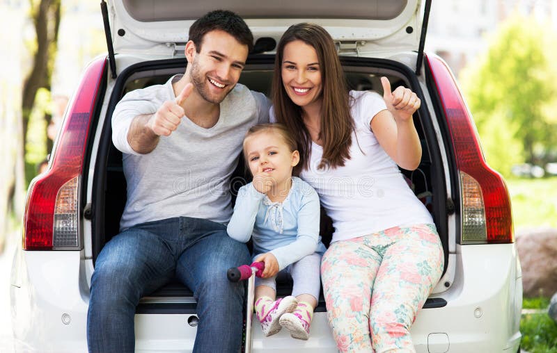 Happy family sitting in the car. Happy family sitting in the car