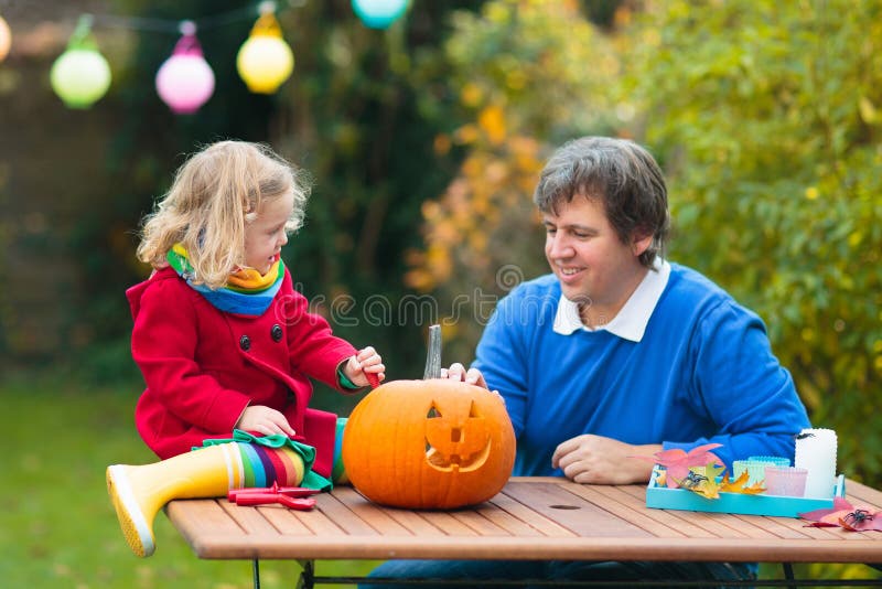 Family Carving Pumpkin for Halloween Stock Photo - Image of lantern ...