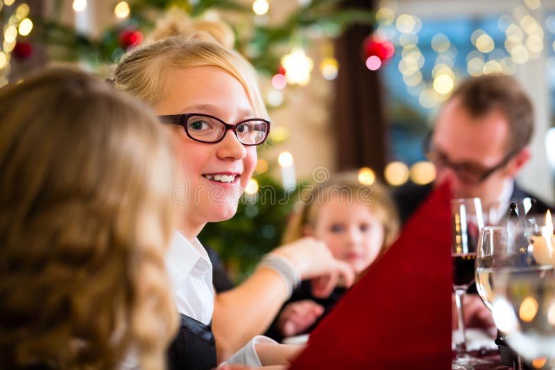 Family celebrating Christmas dinner stock images Family celebrating Christmas dinner stock images