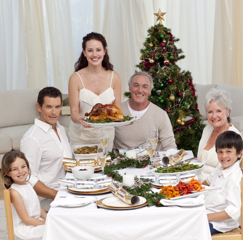 Family Celebrating Christmas Dinner With Turkey Stock Photo - Image of